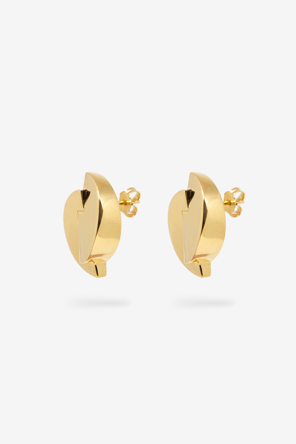 Close-up view of 1989 Dome Earrings in 14k gold vermeil, featuring a hollow design and stud back