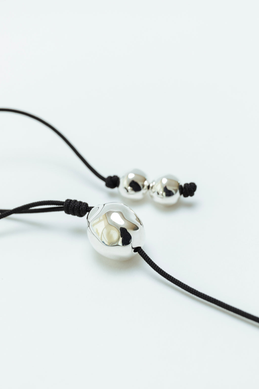 Figure Cord Necklace - Silver
