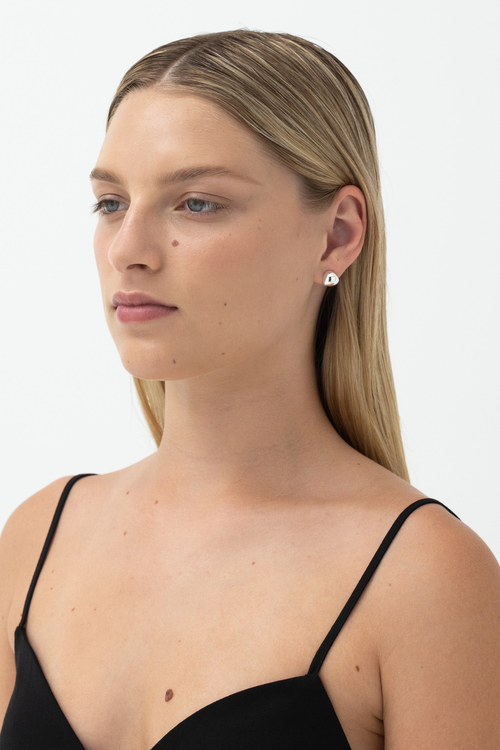 Silver Hoop Earrings: Sleek, versatile hoops for a modern look.