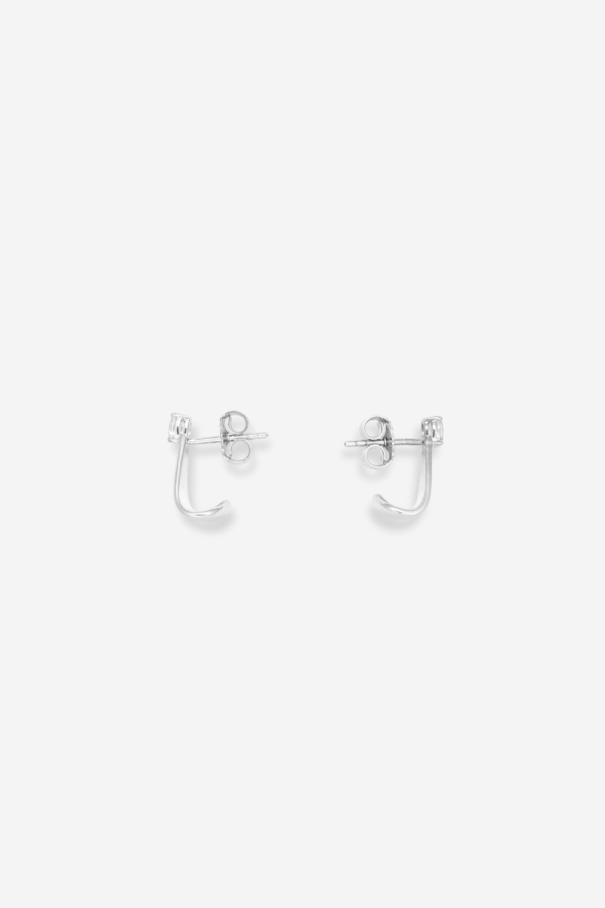 Topaz Curve Huggies - Silver