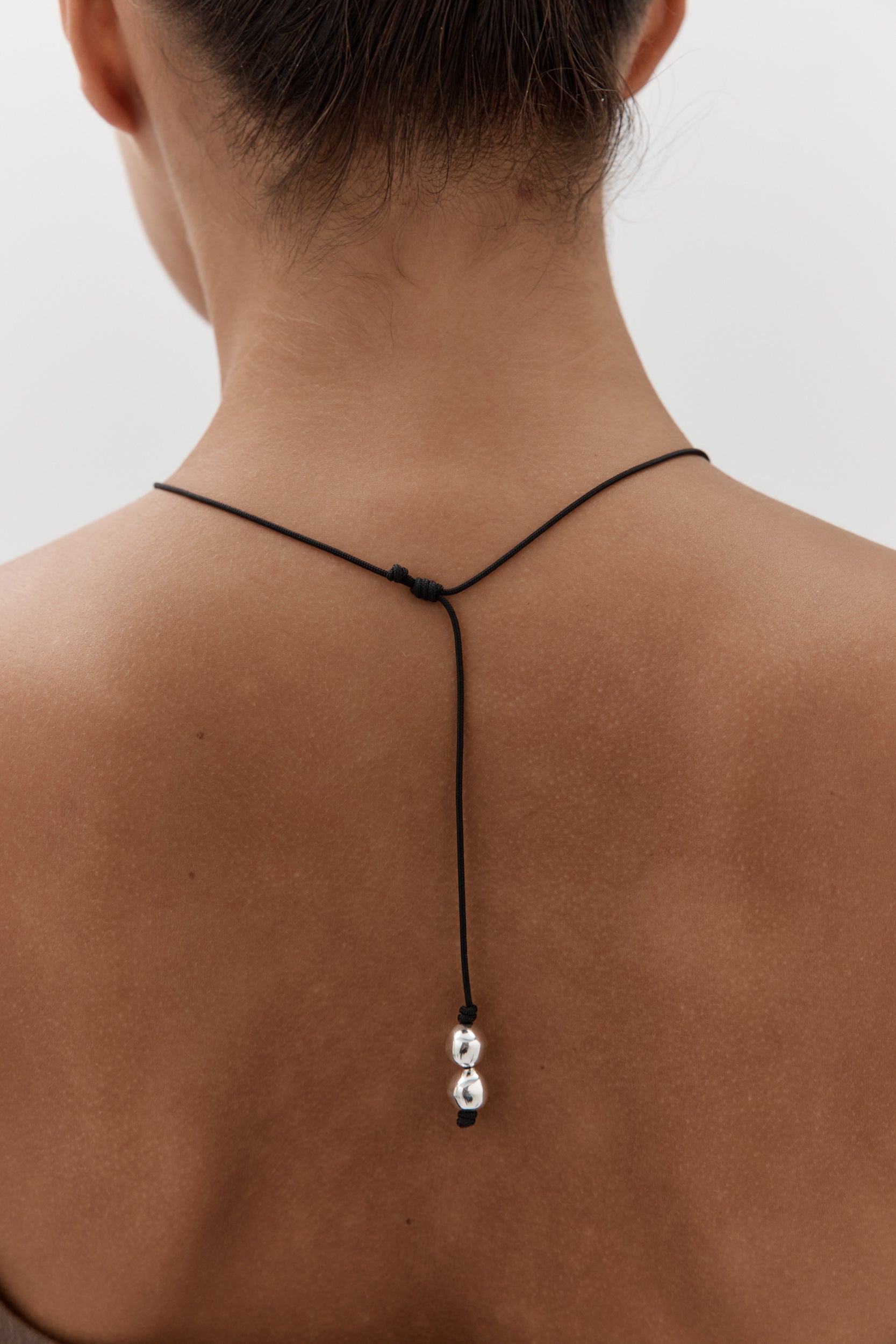 Figure Cord Necklace - Silver